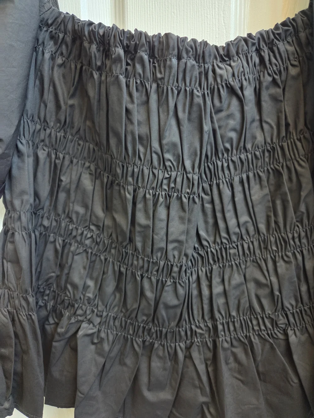 NWOT-Astr Black Smocked Peplum Blouse with Puff Sleeves